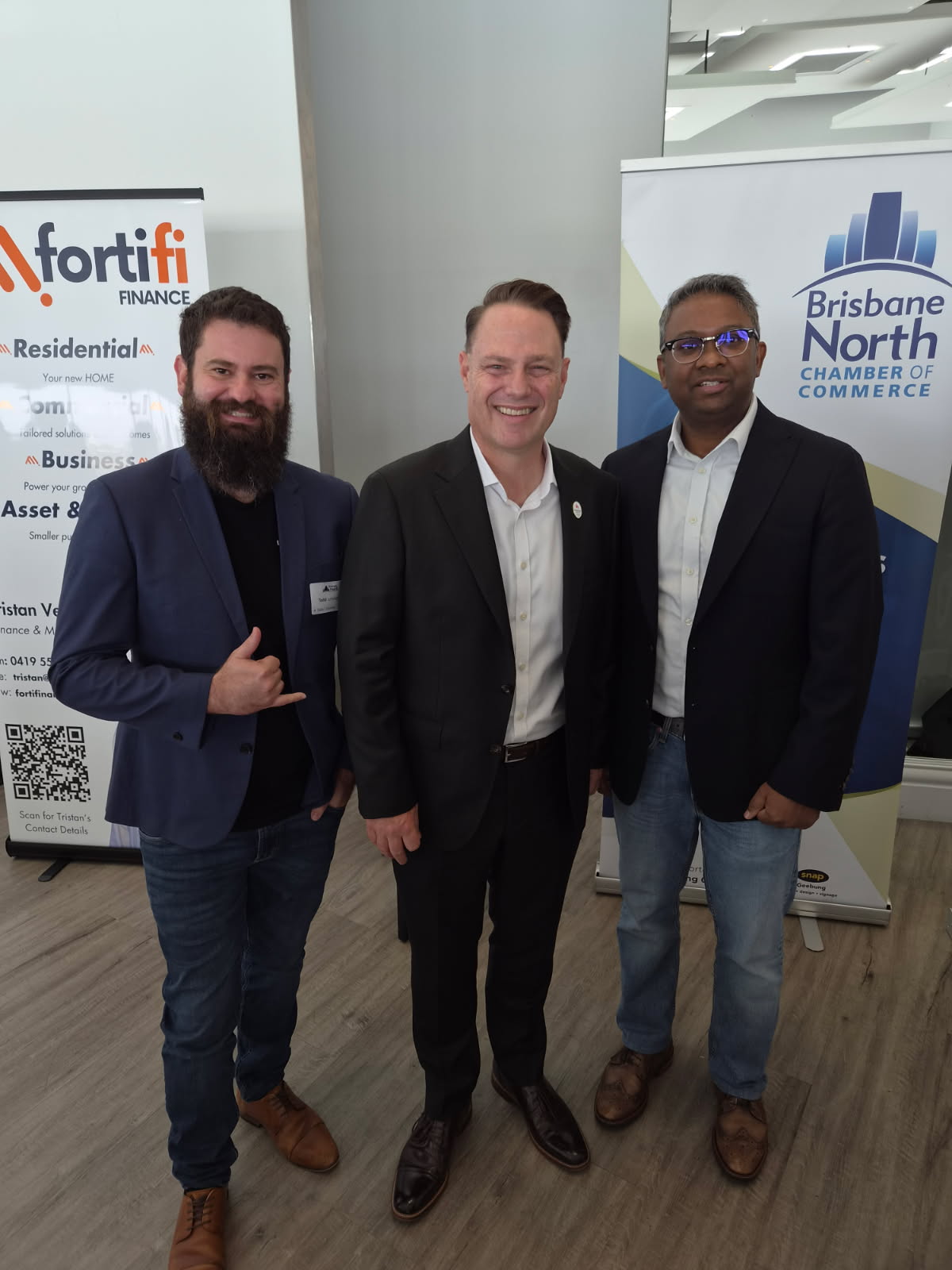 Todd Johnson with Lord Mayor Adrian Schrinner and a fellow attendee at the breakfast