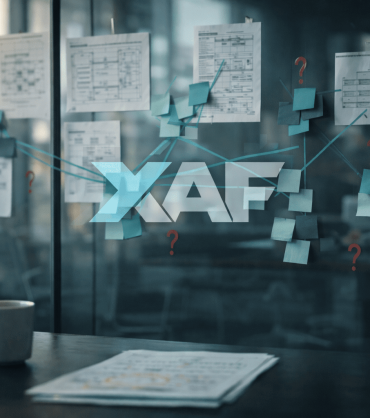 Glass-walled meeting room with architecture diagrams connected by teal marker lines, showing the challenge of linking siloed architecture domains.